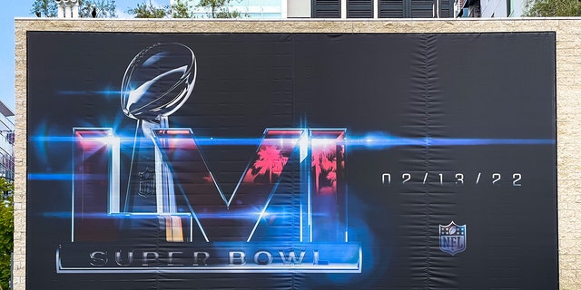 General view of a billboard near Hollywood &amp; Vine featuring the Vince Lombardi Trophy, promoting Super Bowl 56 (Super Bowl LVI) to be held at the SoFi Stadium in Los Angeles on January 18, 2022 in Hollywood, California.