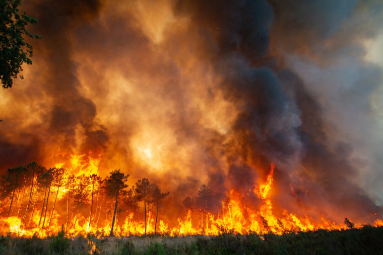 Strong winds and hot, dry weather are frustrating firefighters' efforts to contain a huge wildfire in France's Bordeaux region.