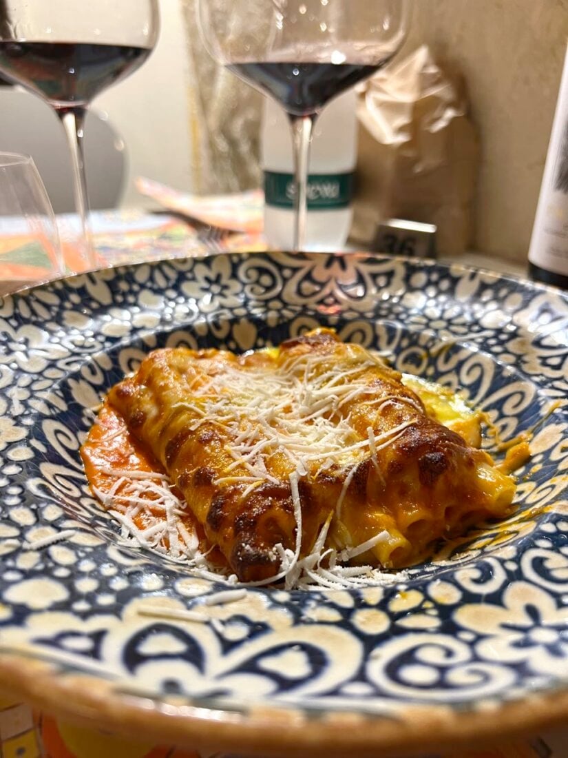 pasta dish with wine at restaurant in matera