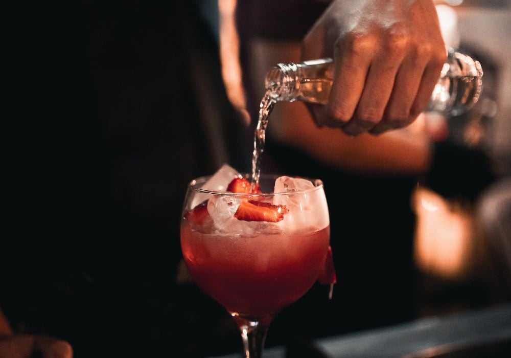 A bartender making a cocktail