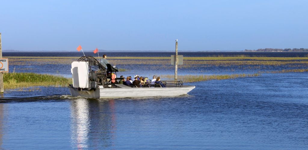 A cool day riding an airboat in the lake. 