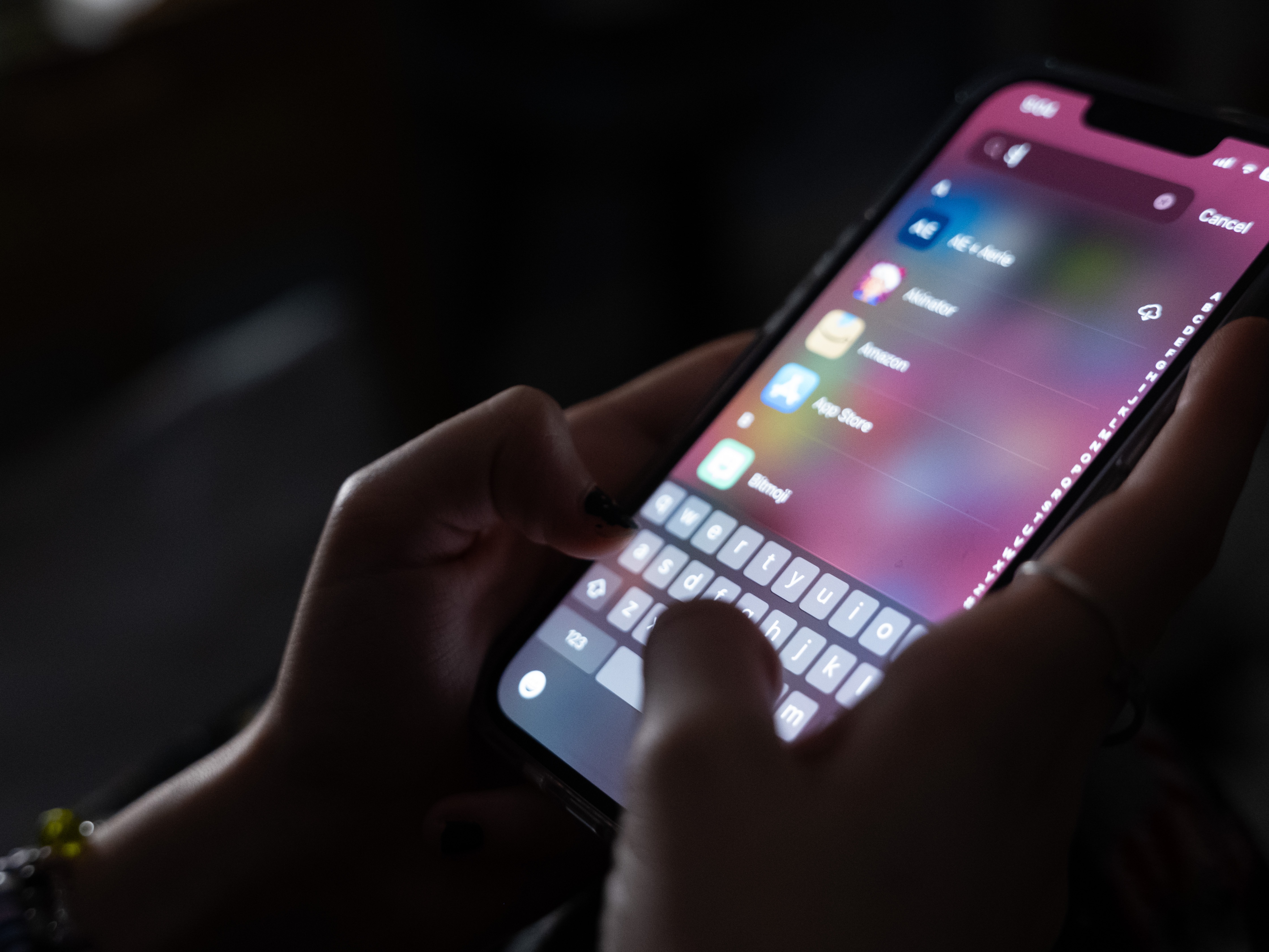 A teenager uses her mobile phone to access social media on Jan. 31, 2024, in New York City. The city may soon become the largest school district in the nation to ban cellphones for students. 