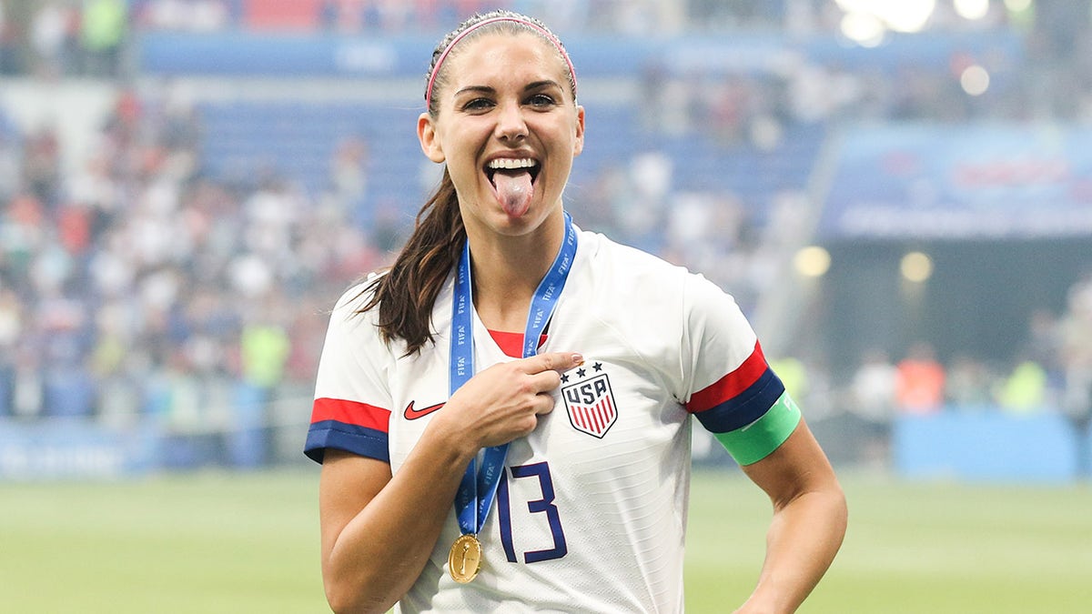 Alex Morgan celebrates