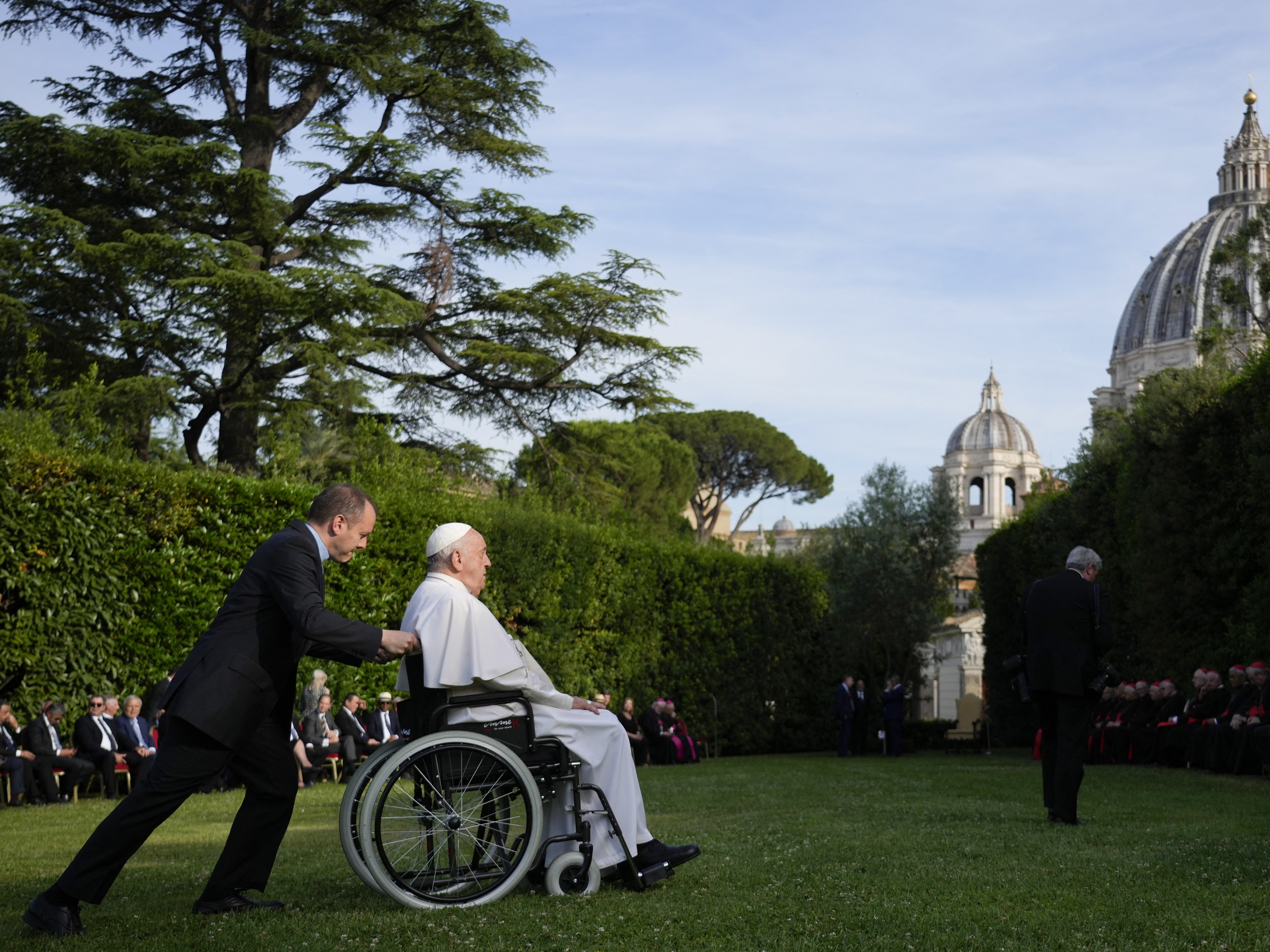 Pope Francis leaves evening prayers in the Vatican Gardens on June 7. The pope will meet this week with G7 leaders to talk about the ethics of artificial intelligence.