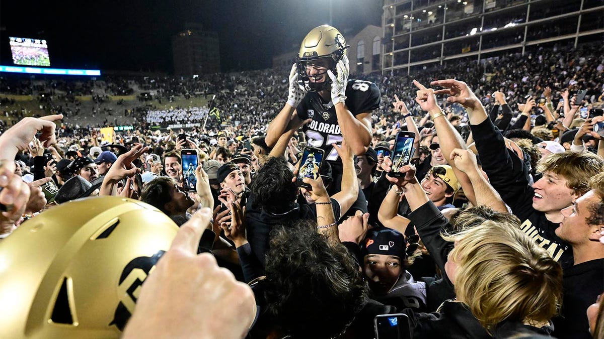 CU fans rush the field