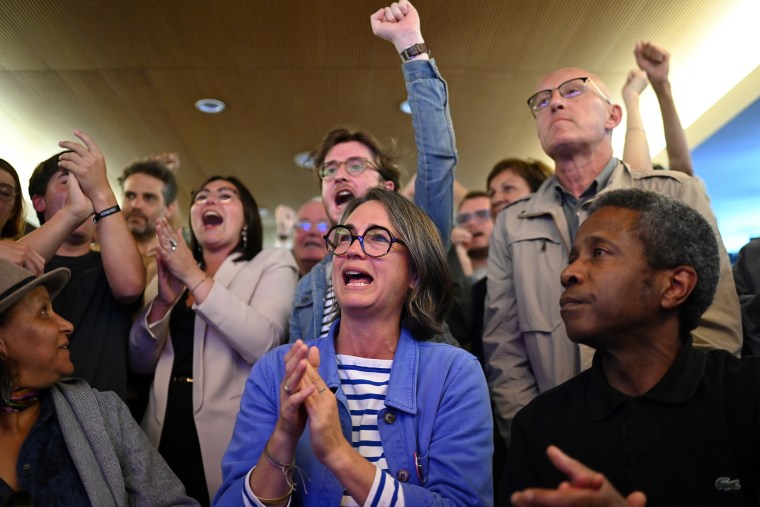 A broad left-wing coalition was leading a tight French legislative election, ahead of both President's centrists and the far right with no group winning an absolute majority, projections showed. 