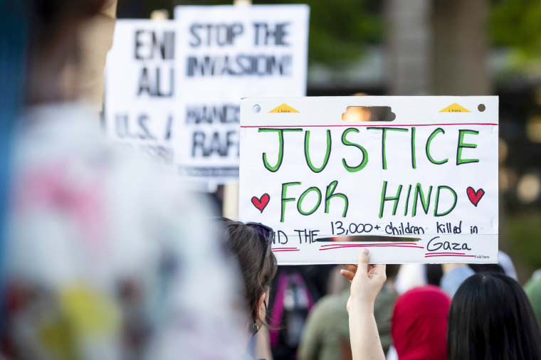 A sign that reads 'JUSTICE FOR HIND.'