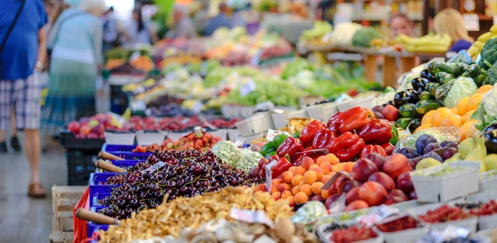 food market, stalls lined with fresh local produce