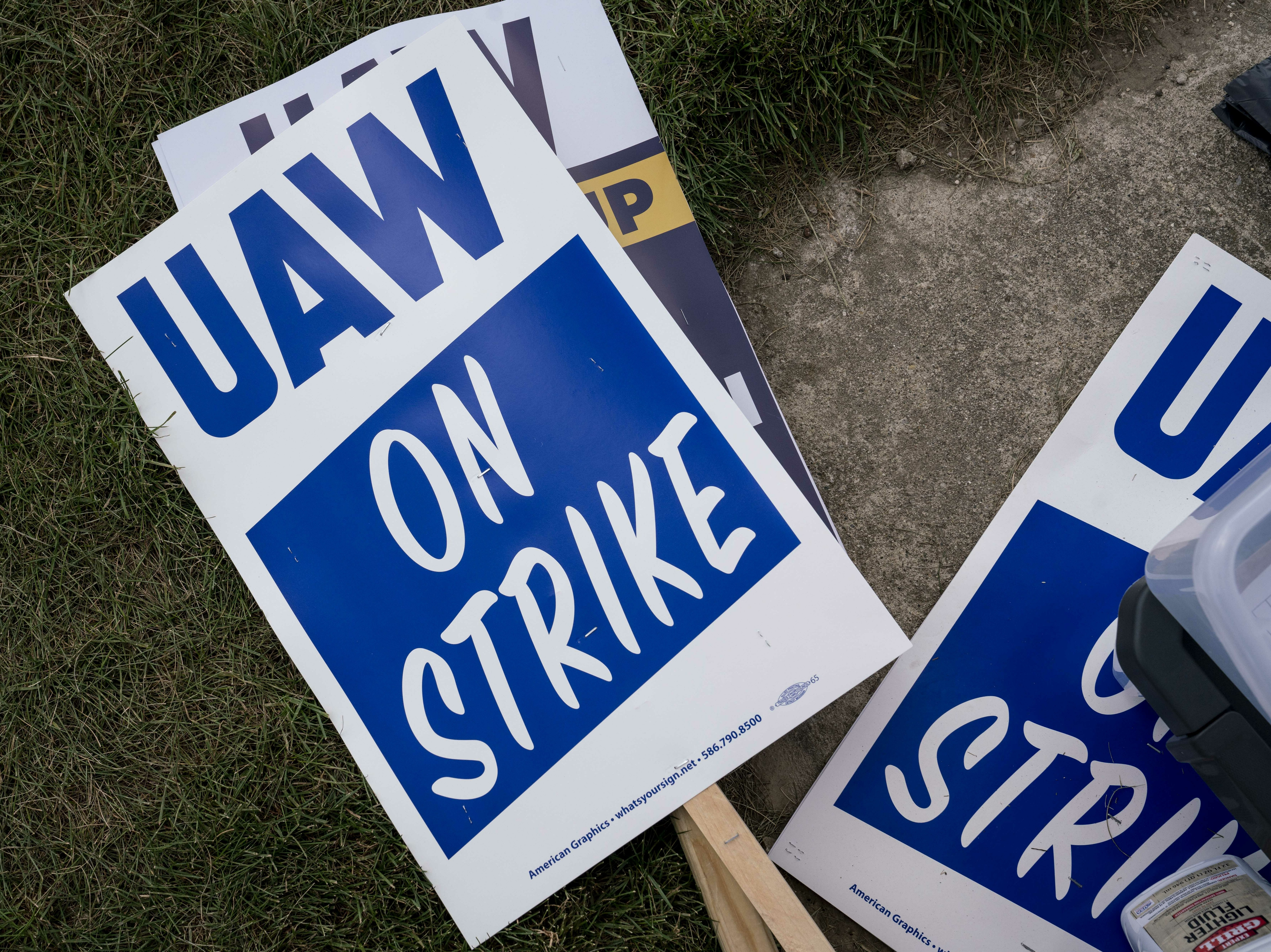 A close-up view of the signs used by the United Auto Workers members to picket outside a Jeep Plant in Toledo, Ohio last September.