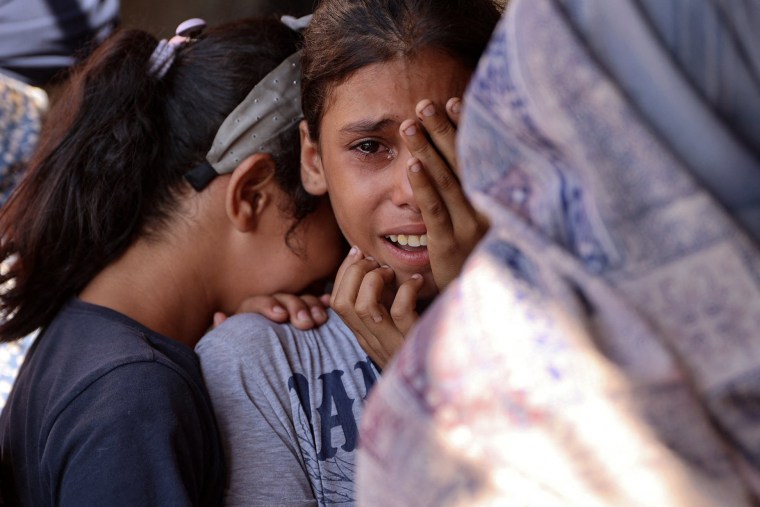 Children react following an Israeli strike on a school sheltering displaced Palestinians near the Jabalia refugee camp in the norther Gaza Strip on Sept. 26, 2024.