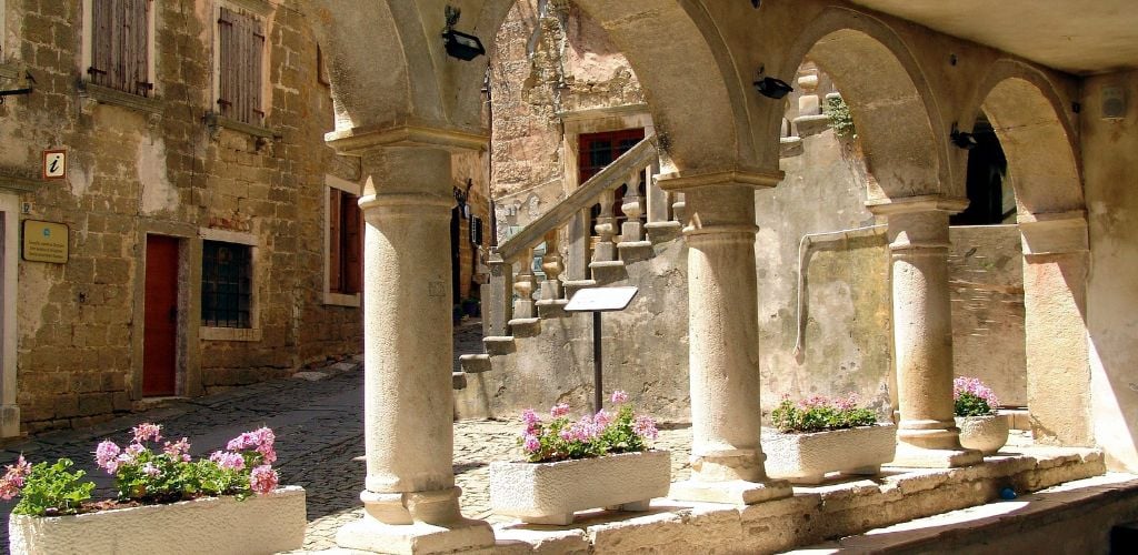 traditional croatian architecture with collums and stone staircase 