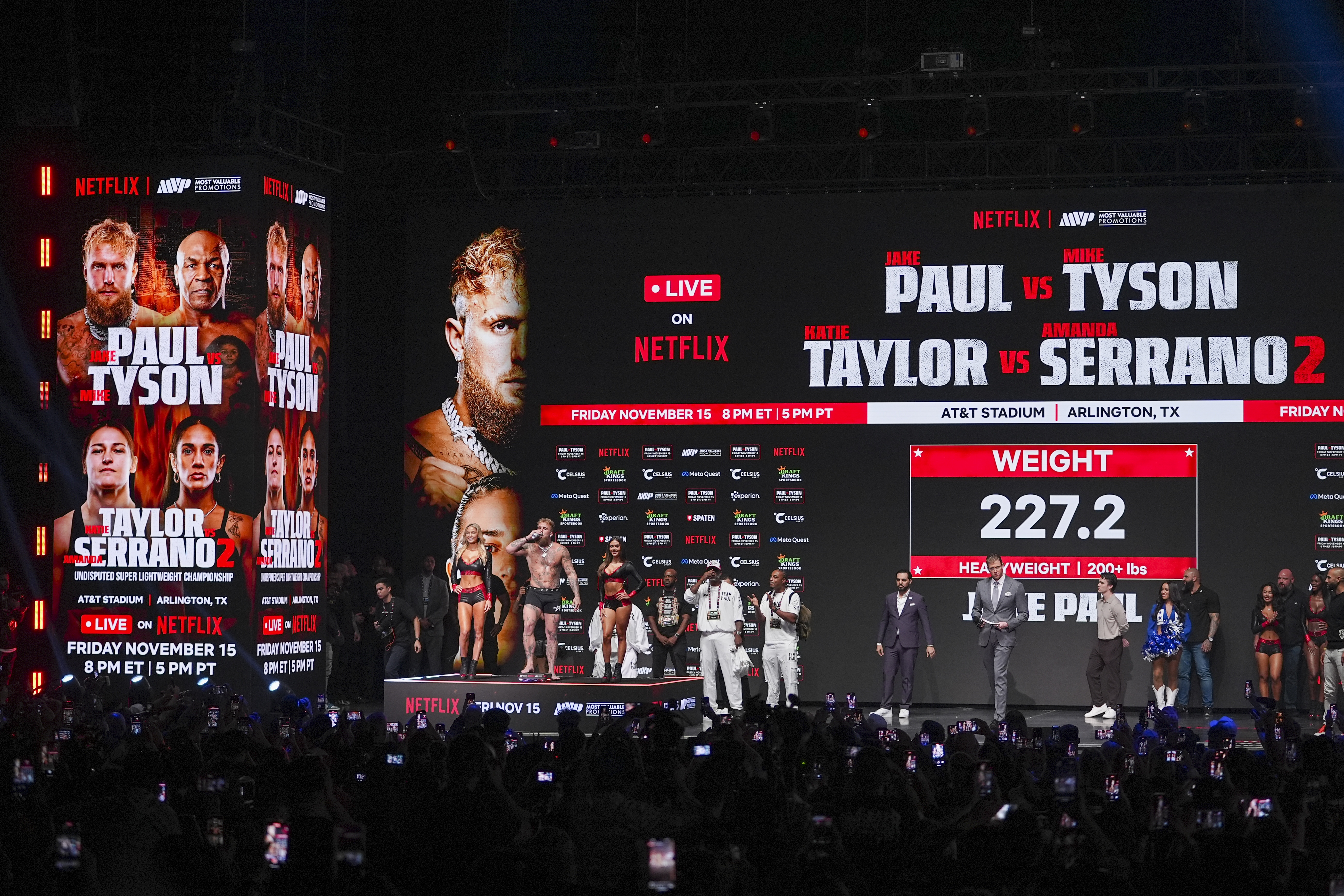 Jake Paul steps on the scale during a weigh-in ahead of his heavyweight bout against Mike Tyson on Nov. 14 in Irving, Texas.