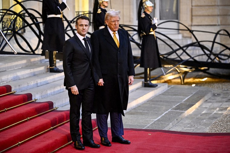 Emmanuel Macron welcomes Donald Trump.