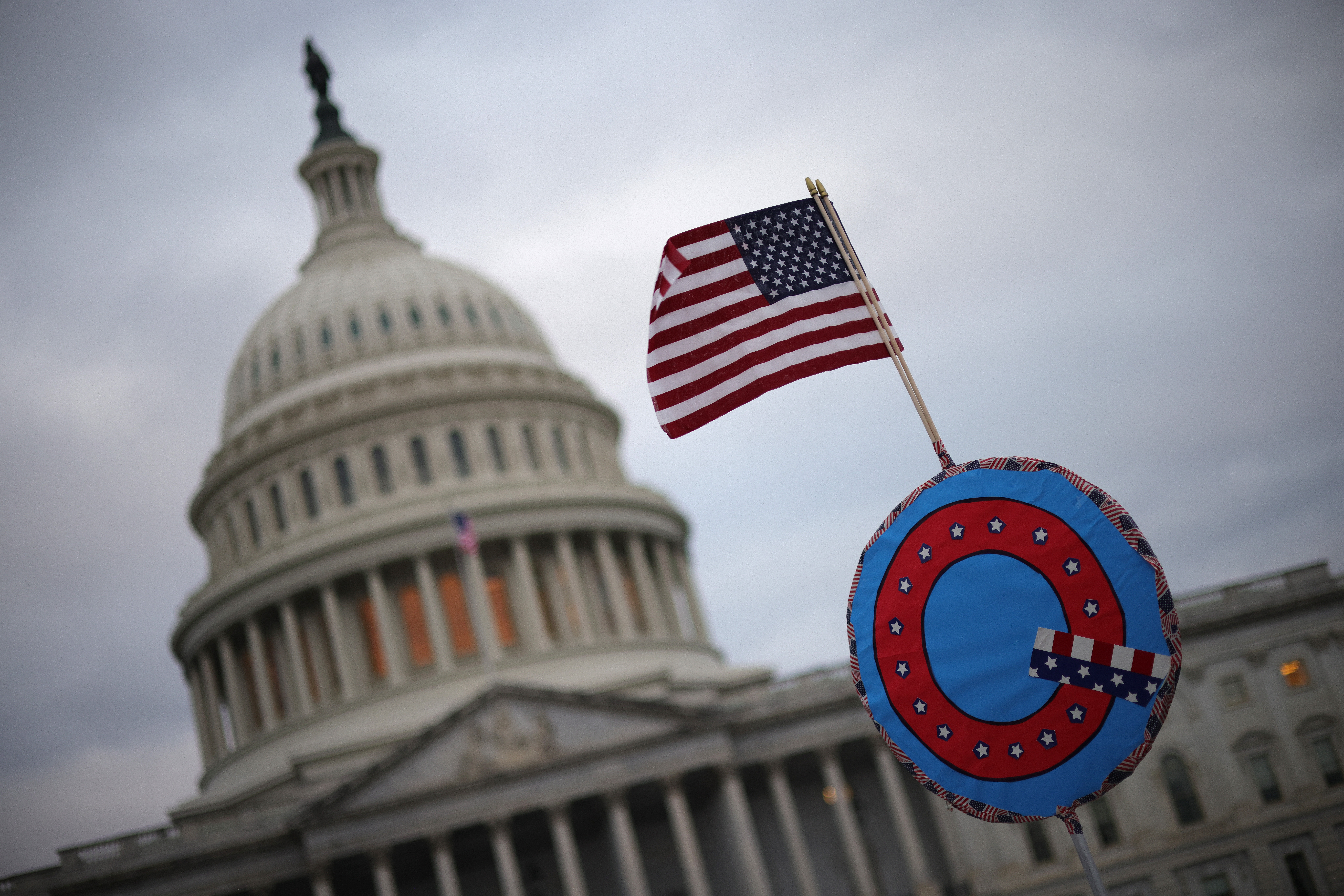 A QAnon sign at the U.S. Capitol on Jan. 6, 2021. Many of the rioters who attacked the Capitol later told investigators they were motivated in part by the online conspiracy theory.