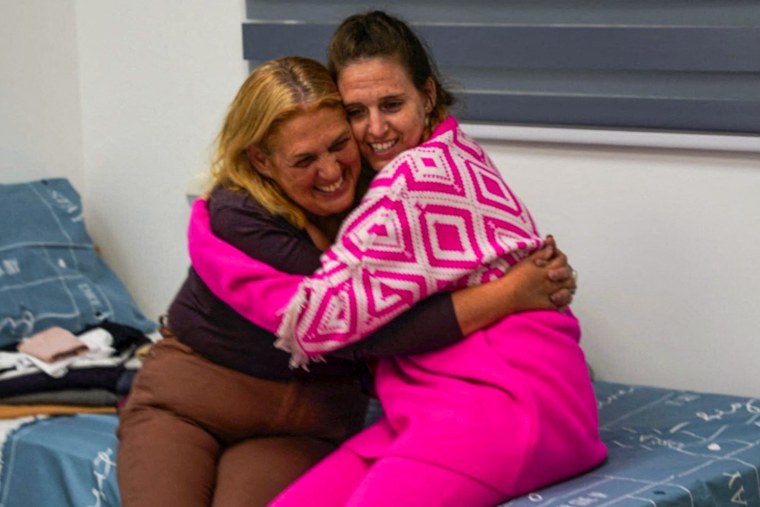 Doron Steinbracher hugs her mother.