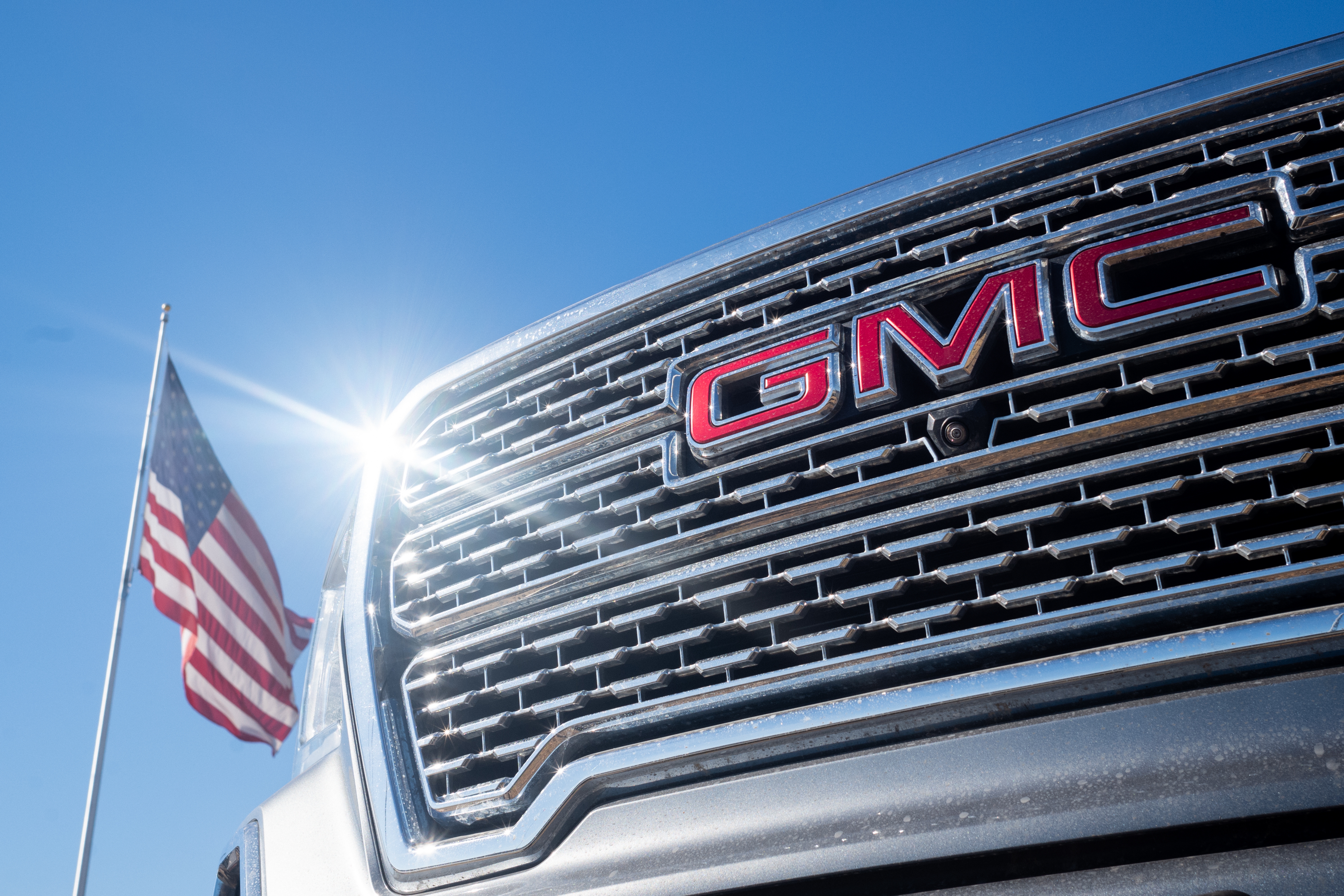 AUSTIN, TEXAS: A GMC pickup truck is displayed for sale on a lot at a General Motors dealership in Austin, Texas. Last year, General Motors told investors in its annual report that "we are committed to fostering a culture of diversity, equity and inclusion." But in its latest report, published last week, GM doesn