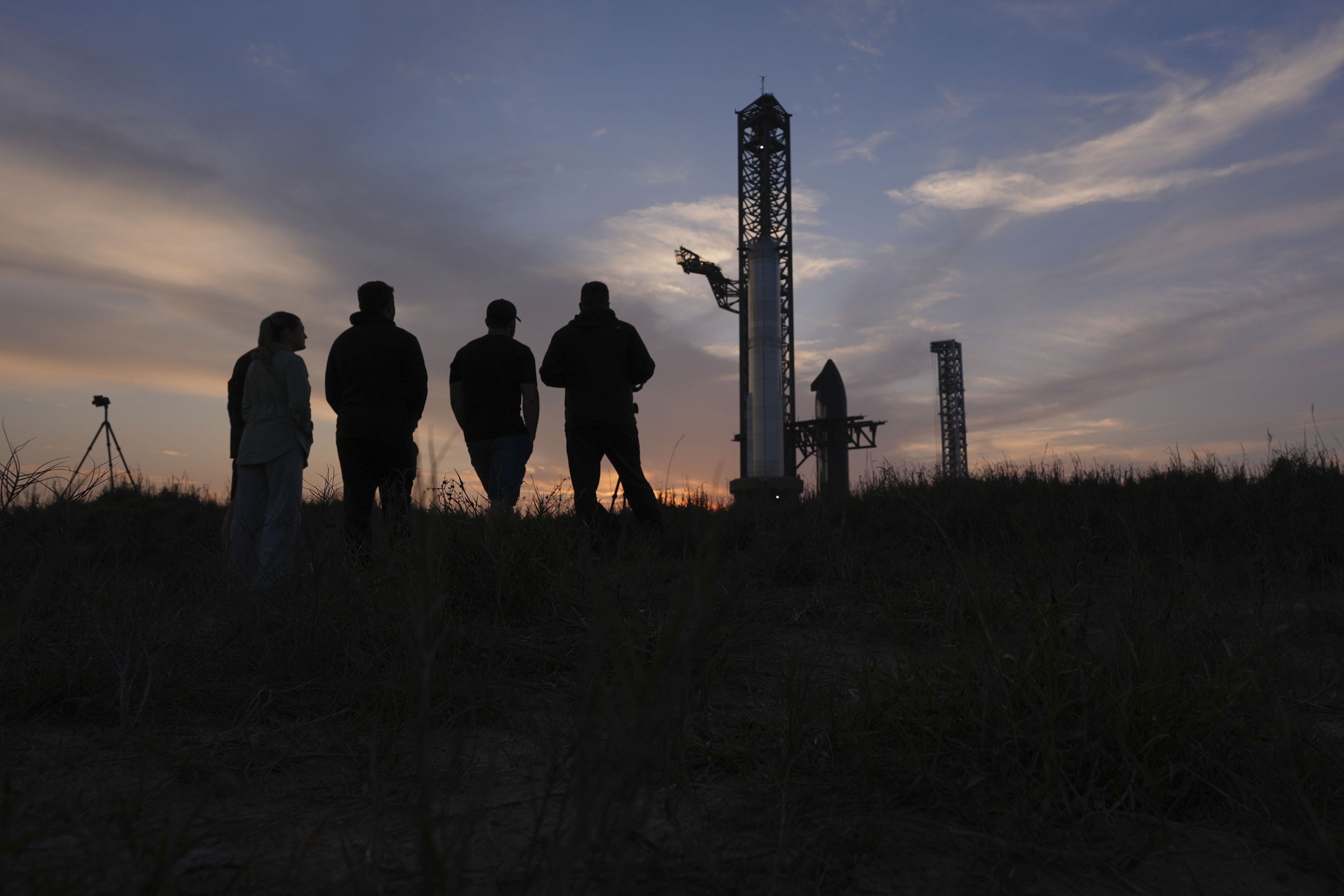 Visitors watch as SpaceX